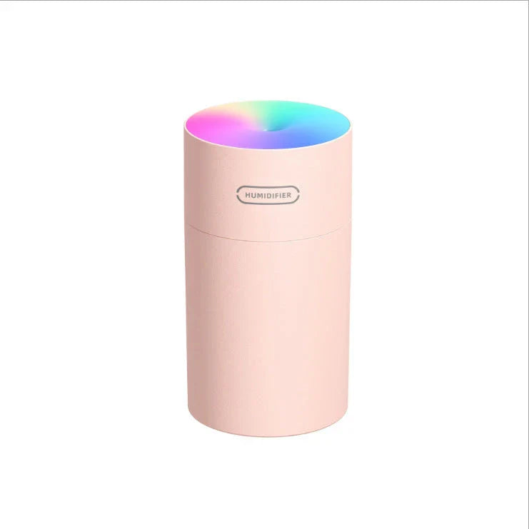 Compact and Quiet Bedroom Mist Humidifier with Soothing Mood Lighting in White, Navy Blue, and Pink Colors
