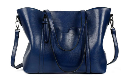 Retro messenger bag showing 31cm length, A4 magazine capacity, available in eight colours including wine red and light blue