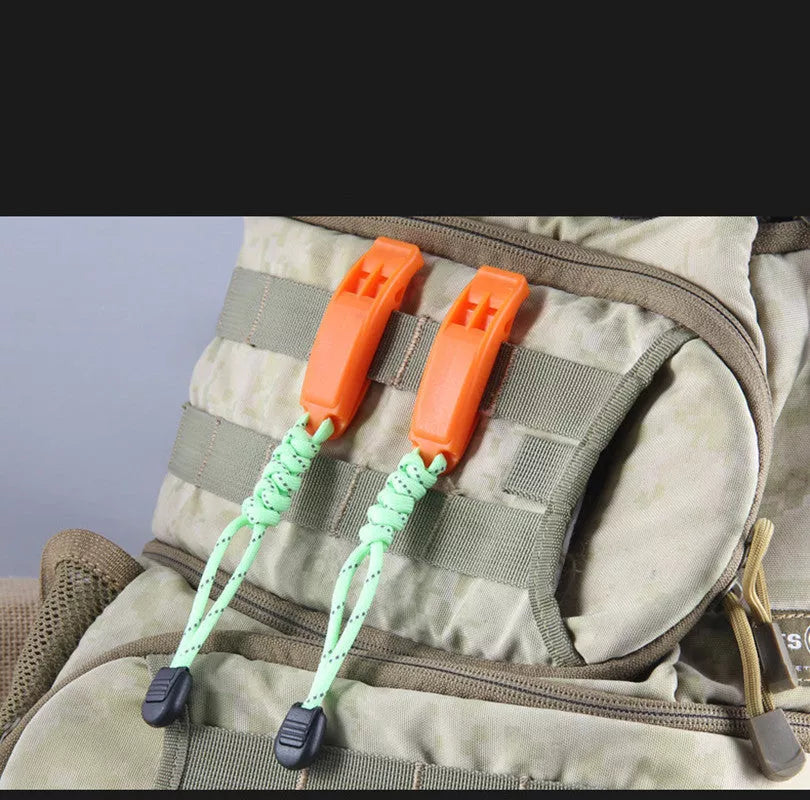 Fire Survival Whistle with dual-frequency sound emission for emergency signaling