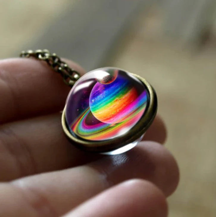 Mesmerizing double-sided galaxy pendant necklace in various celestial patterns and colors