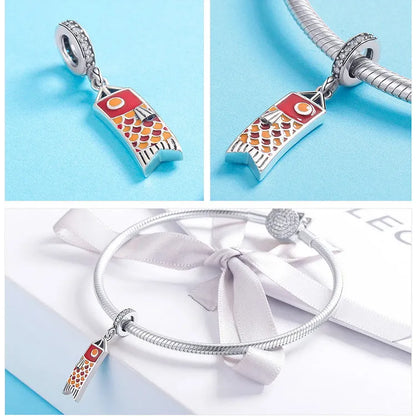 S925 sterling silver carp streamer pendant with zircon accents measuring 28mm tall