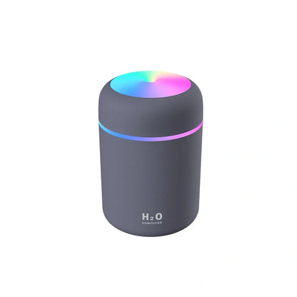 Compact USB car humidifier with colourful LED light and 300ml water tank for vehicle use
