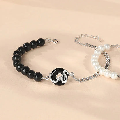 925 sterling silver couple's bracelet with obsidian pearl and snake detail in New Chinese style.
