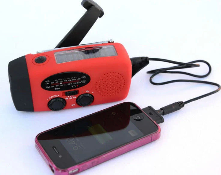 Powerful solar-powered radio and flashlight with hand crank and USB charging capabilities