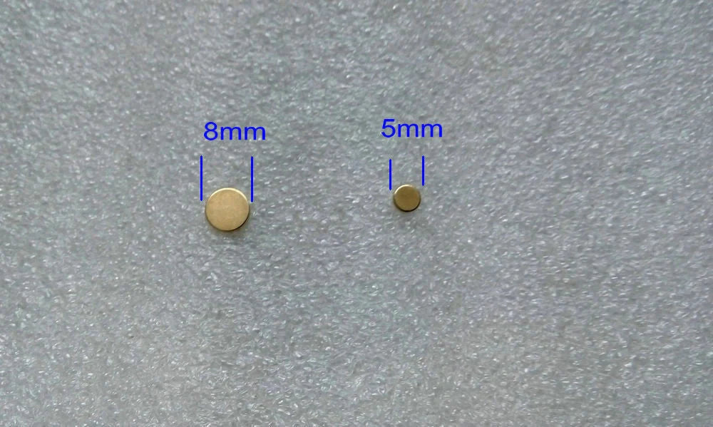 Discreet gold-toned anti-smoking auricular therapy magnet for quitting smoking through acupressure