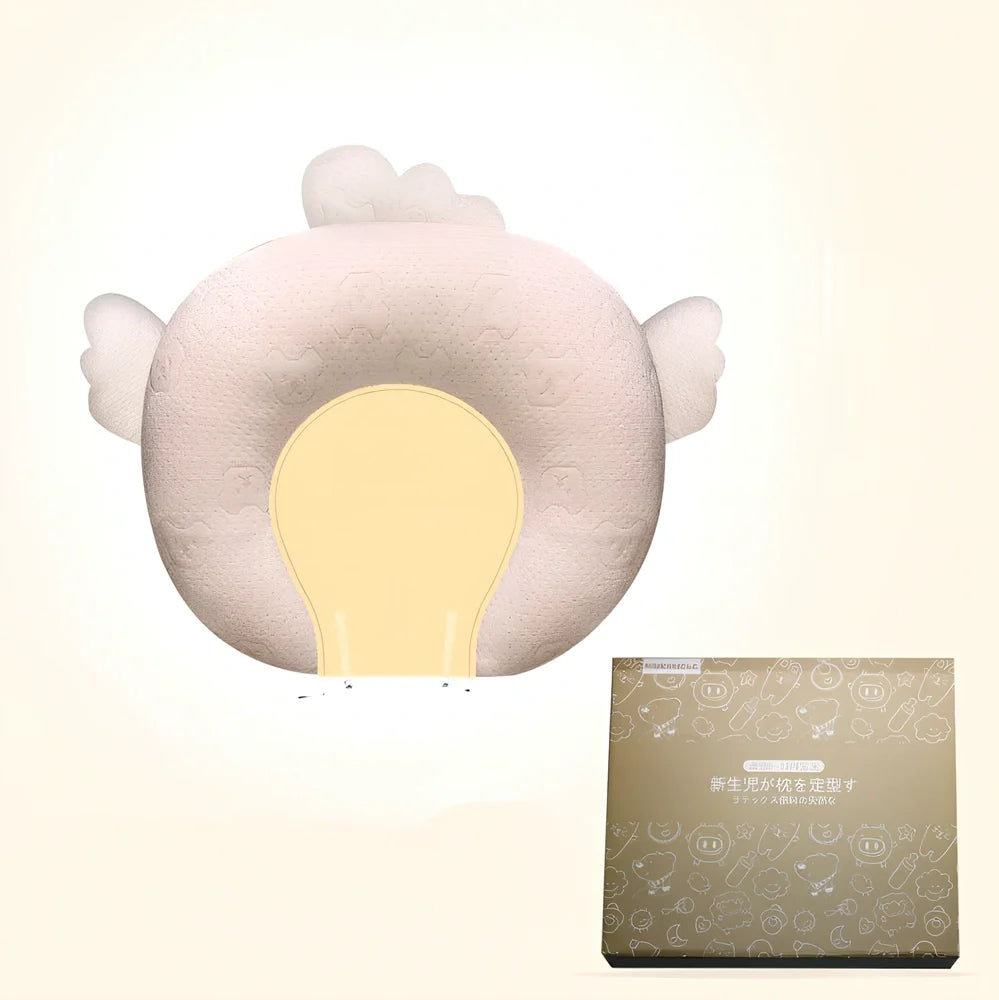 White baby pillow with latex core measuring 30x40cm for infant head support