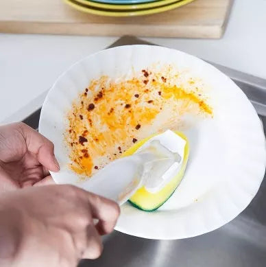 Non-stick kitchen oil pot brush with yellow head and transparent handle, featuring a scraper edge
