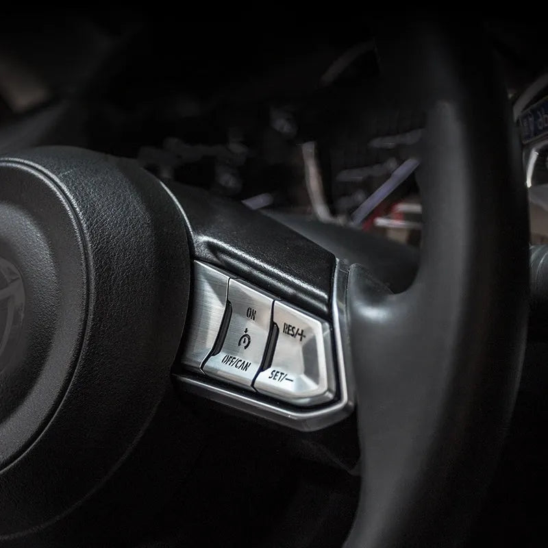 Aluminium alloy steering wheel decorative stickers in brushed red, silver, and blue transparent button designs