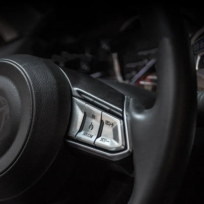Aluminium alloy steering wheel decorative stickers in brushed red, silver, and blue transparent button designs