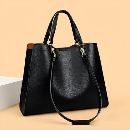 Women's horizontal square messenger tote bag in PU leather with crossbody strap and internal compartments.