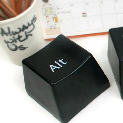 A set of three keyboard-inspired beverage cups with an attached tray, providing a unique and stylish desk accessory.