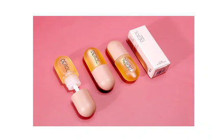 Day Night Instant Volume Lip Plumper Oil in light yellow for hydrated, plump lips