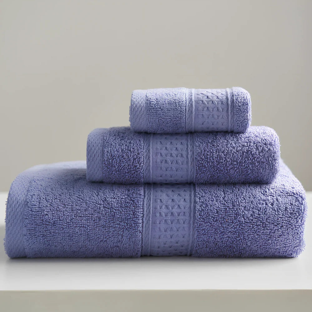 Three cotton towels: 33cm square, 32cm×73cm standard, 70cm×140cm bath towel in coordinated colours