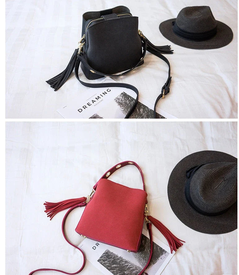 A stylish frosted tassel bucket bag with interior pockets and a versatile shoulder strap design