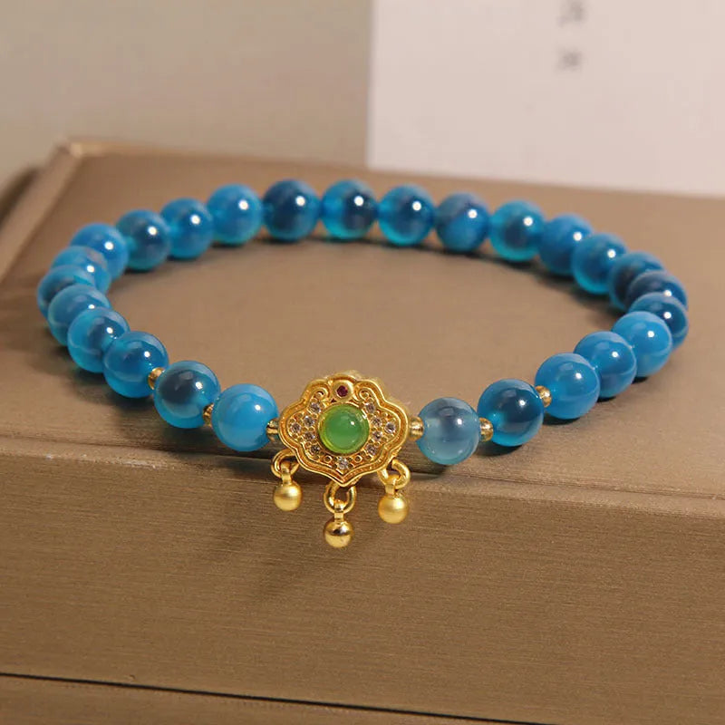 Women's bracelet with safety lock pendant featuring blue sugar heart agate jade and alloy inlay artificial gemstone accents, a rhinestone-adorned crystal piece with precise weight specification for secure wear
