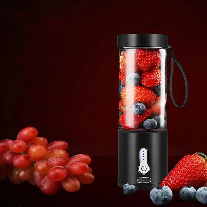 Hand operated portable blender in black, white, blue, and rose red with rechargeable battery and 530ml capacity