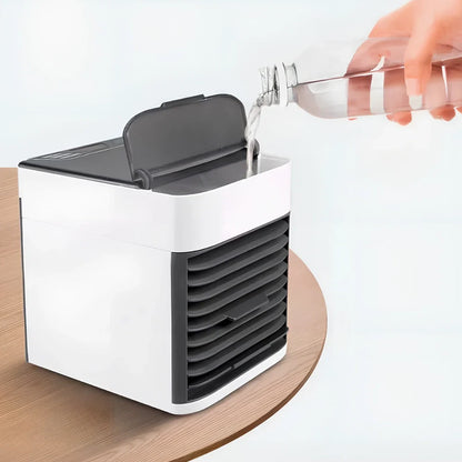 Desktop air conditioner fan with USB cable and water tank showing 7-colour LED lighting and mechanical control dial