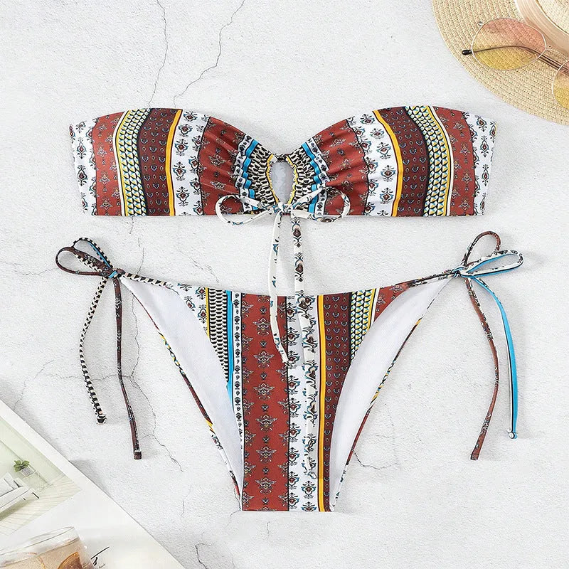 Women's mixed colour printed lace-up swimsuit with side split, shown as a one-piece