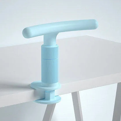Children's ABS desk-mounted sitting posture corrector in blue, pink, or white for study desks.