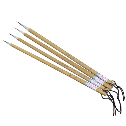Four traditional Chinese calligraphy brushes with thin gold bodies and pine branch design