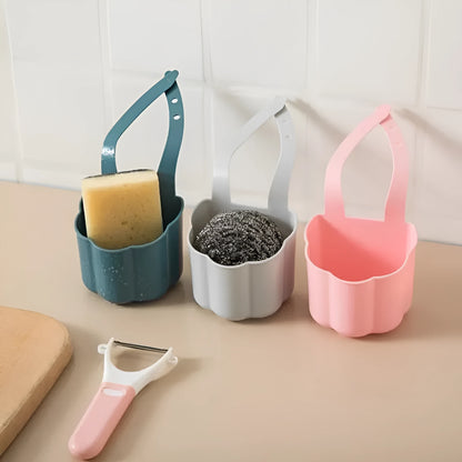 Nordic style plastic sink drain basket with draining compartment in blue, grey, or pink colour options.