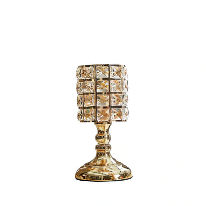 Three golden metal candle holders in small 21 cm, medium 31 cm, and large 36 cm sizes with 11x11 cm bases for table decor