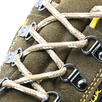 Bronze low-cut leather safety shoes with steel toe cap and patterned non-slip rubber sole.