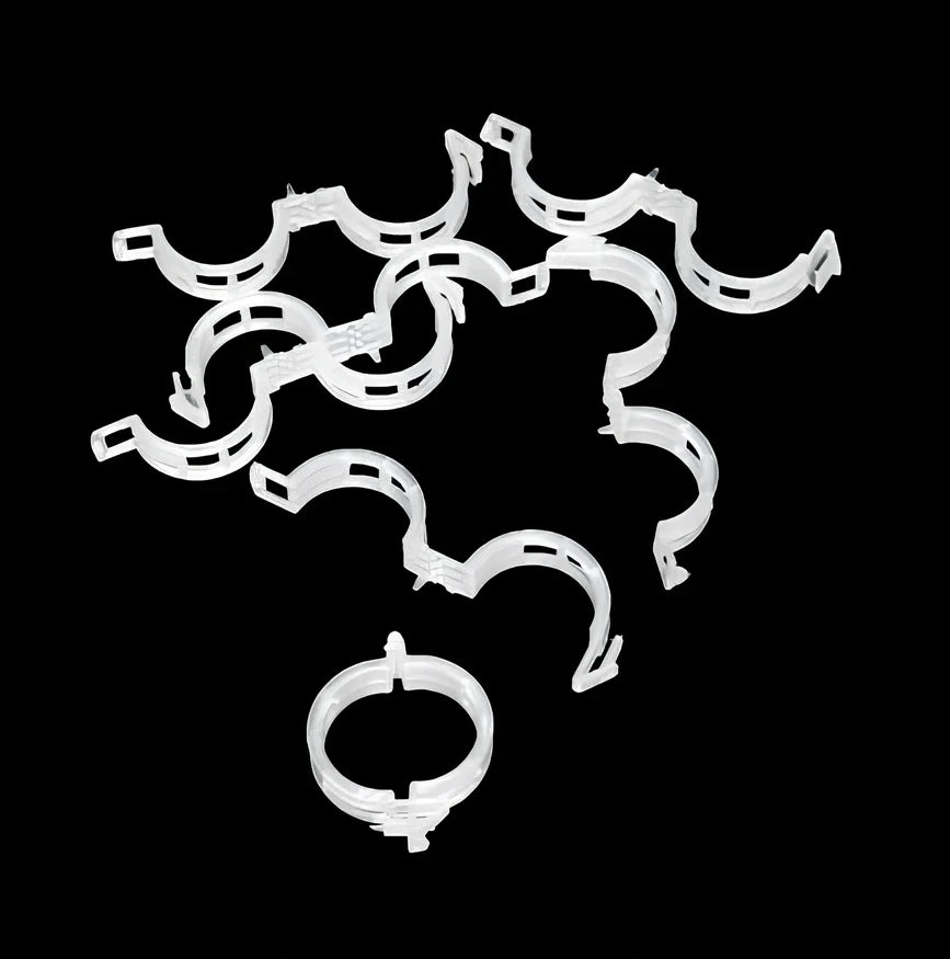 Plastic tomato plant grafting clips showing 3-4cm diameter and smooth surface texture