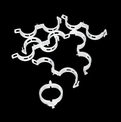 Plastic tomato plant grafting clips showing 3-4cm diameter and smooth surface texture