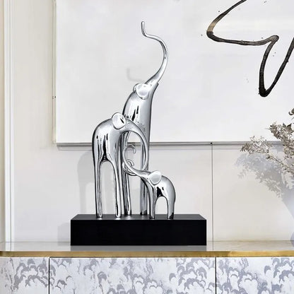 Fortune Bring Elephant resin decorative figurine in gold finish, 15cm tall on a wooden surface.