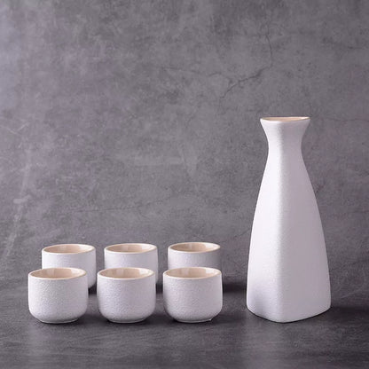 Sakura vintage sake set with ceramic kettle, wine glass, and triangle pot in traditional Japanese design