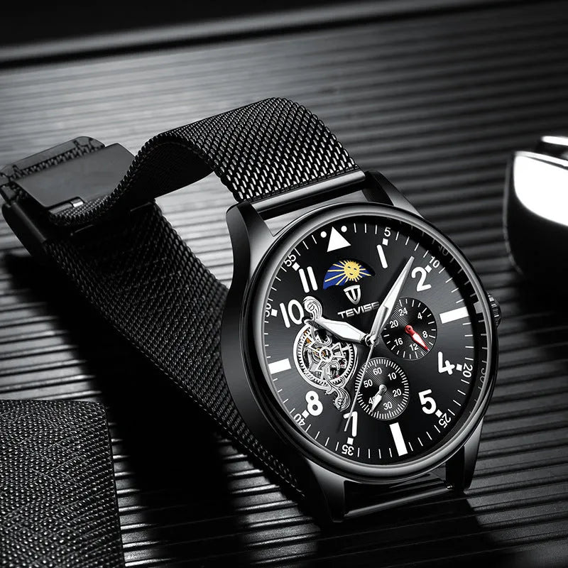 Men's black mechanical watch with moon phase indicator and luminous hands on alloy case
