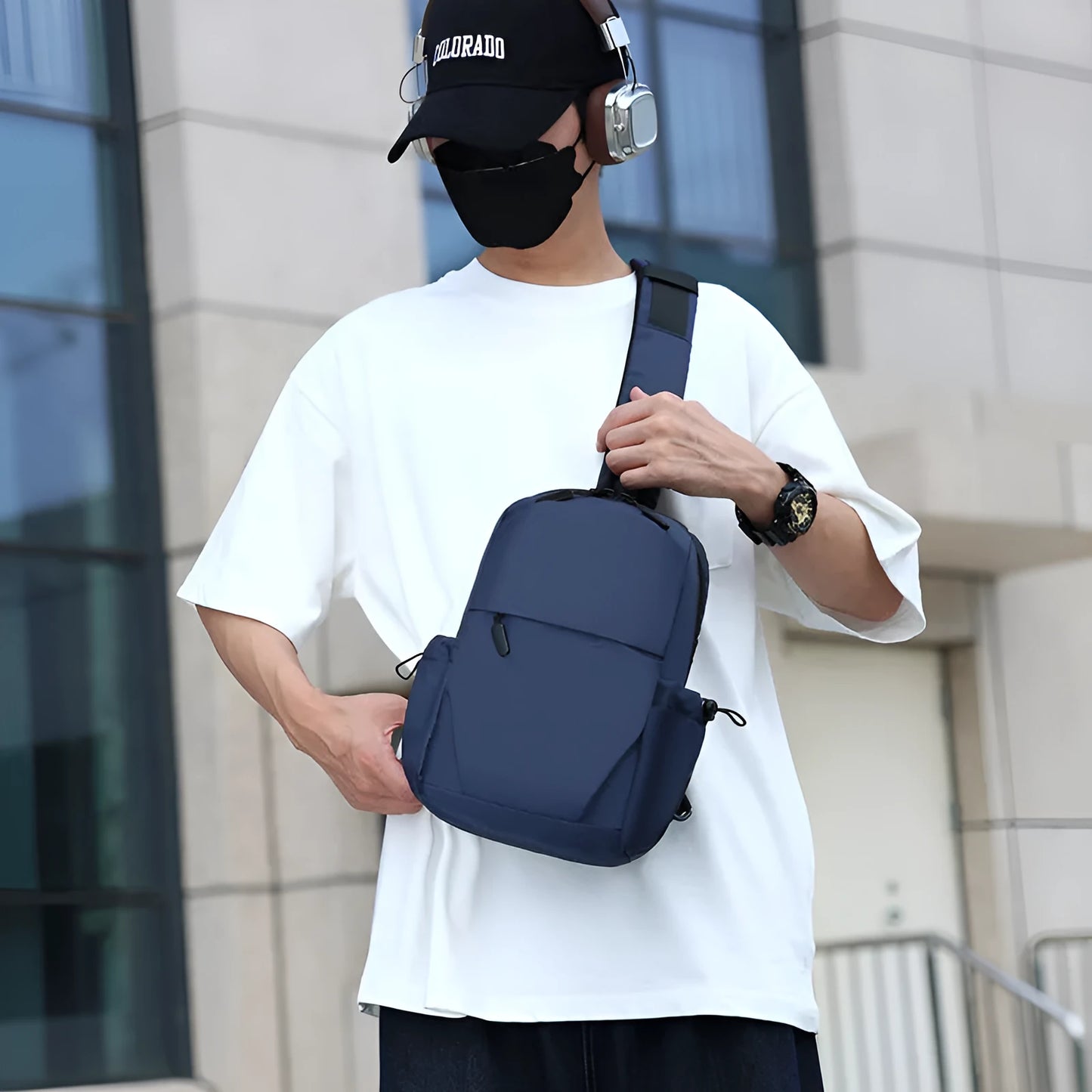 Grey waterproof polyester chest bag with shoulder strap showing 33cm height and 20cm width dimensions