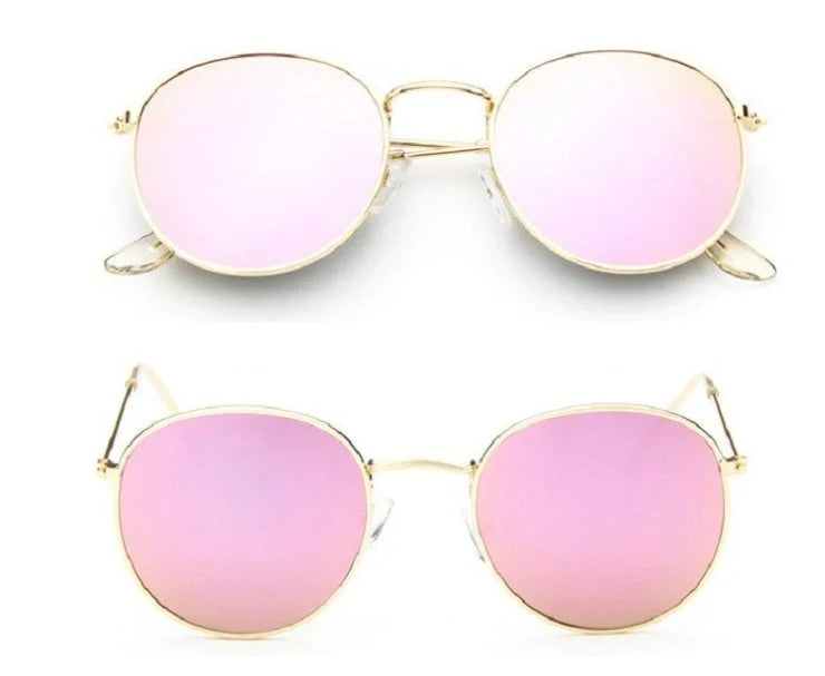 Stylish women's retro sunglasses with round frame and metal finish