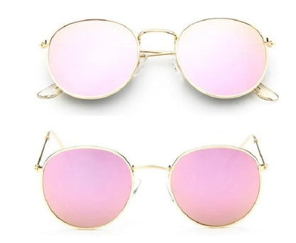 Stylish women's retro sunglasses with round frame and metal finish