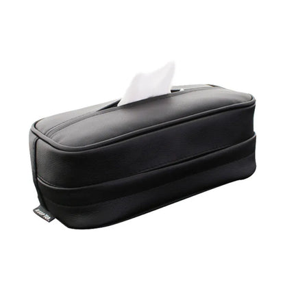 Black leather hanging storage box with PU coating, dimensions 23x13x9cm, shown behind a car headrest