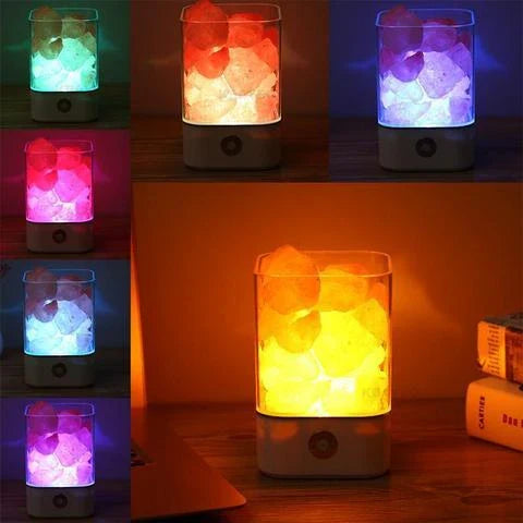 Himalayan salt lamp with warm, soothing glow and color-changing capabilities for air purification and relaxation