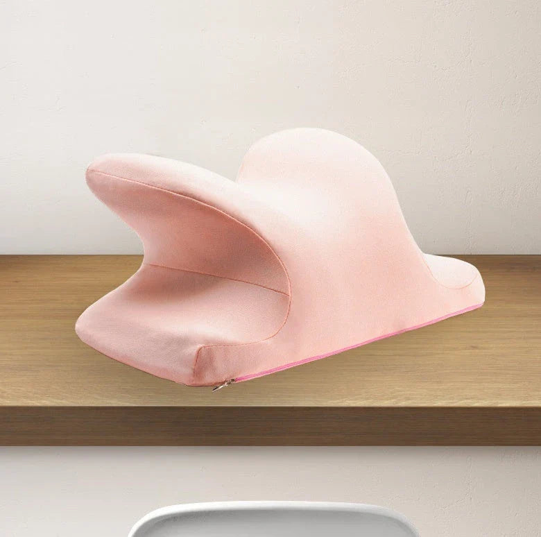 Ergonomic memory foam nap pillow with unique 'butterfly' shape design for comfortable desk or classroom power naps