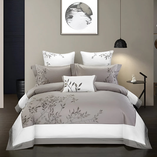 Four-piece cotton embroidery bedding set in satin weave with decorative patterns