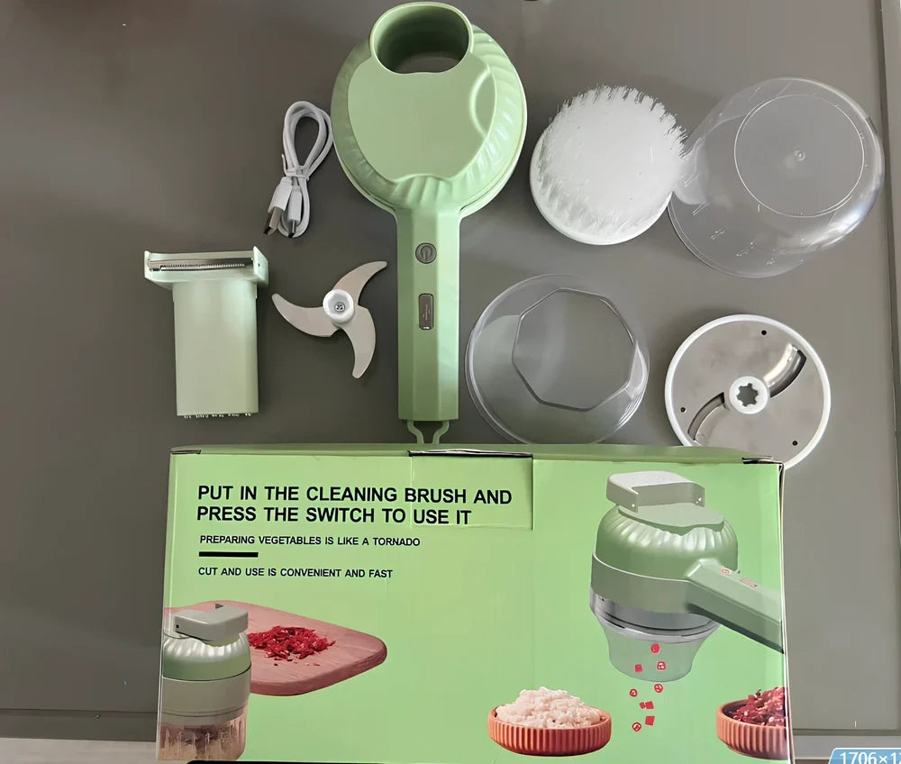 Green wireless vegetable cutter with stainless steel blade and transparent container for food processing