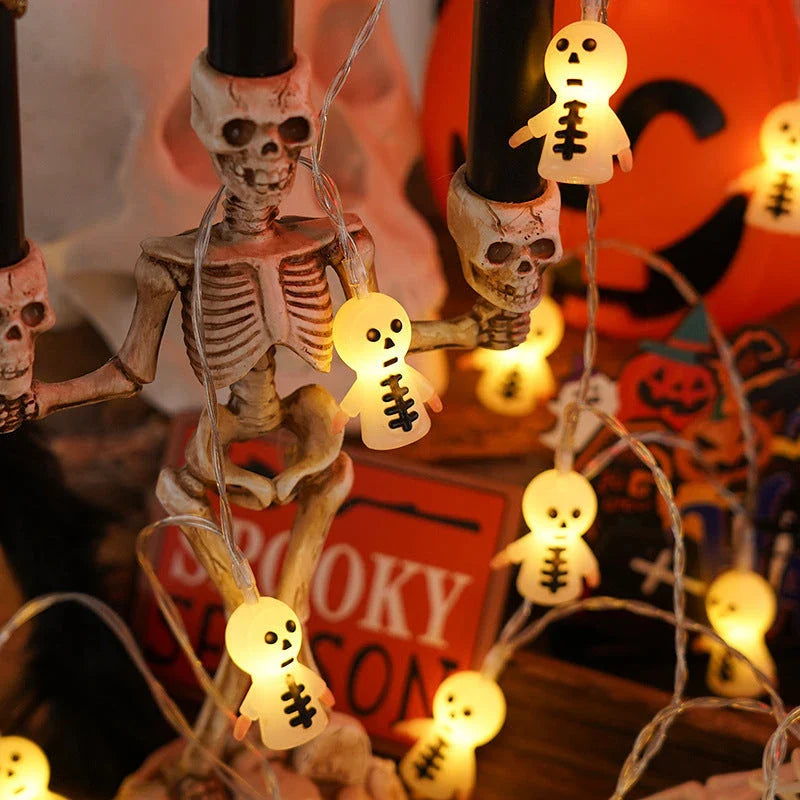Warm glowing Halloween lighting chain with pumpkins, ghosts, and bats for indoor and outdoor decoration