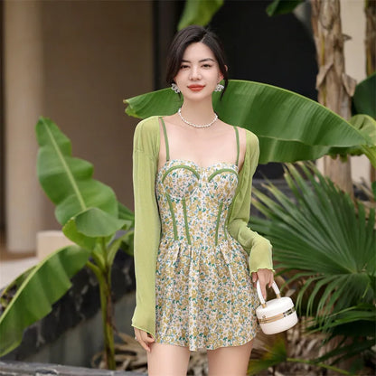 Women's floral jumpsuit swimsuit with adjustable suspender straps in pink or green colour options