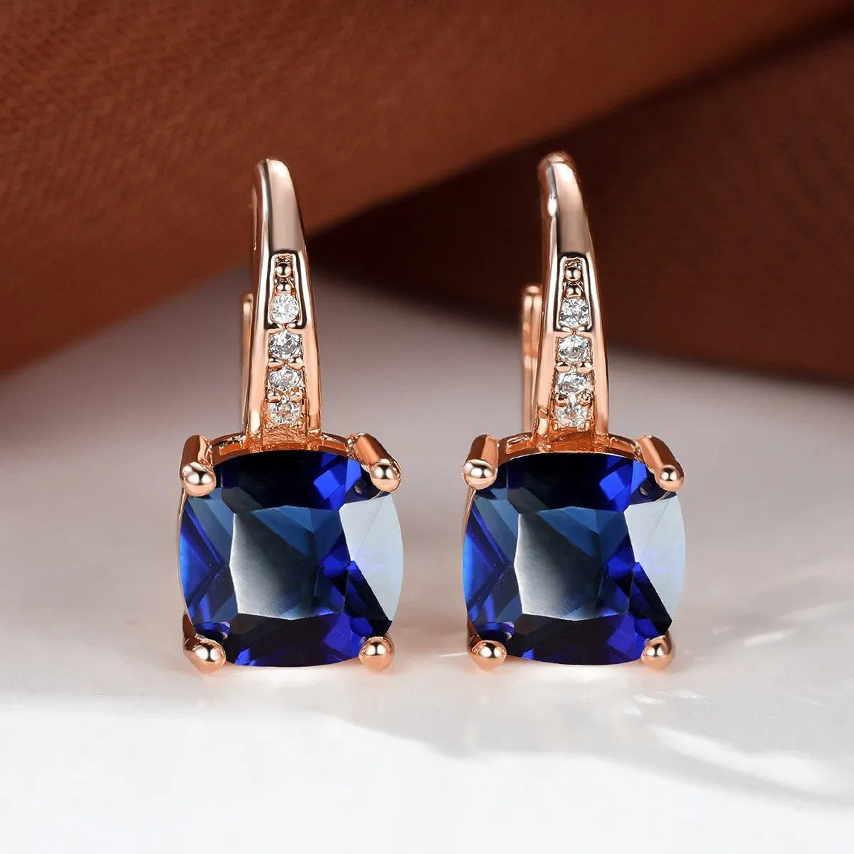 Square zircon inlaid ear hook earrings with geometric design and electroplated finish in golden tone