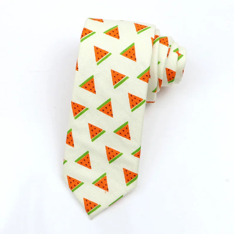 A narrow Korean-style cotton bow tie featuring a cartoon print, shown in a selection of colours.