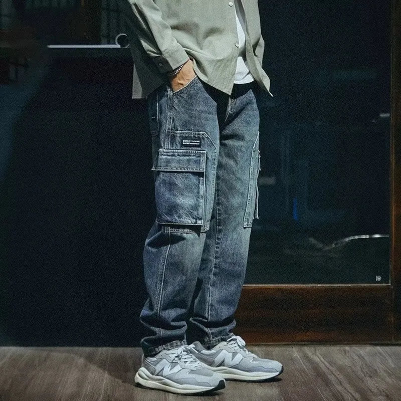 Men's loose straight leg jeans in a retro casual style with stretch comfort, available in classic blue denim with a standard thickness and zip fly fastening, sized from medium up to triple extra-large for leisure wear