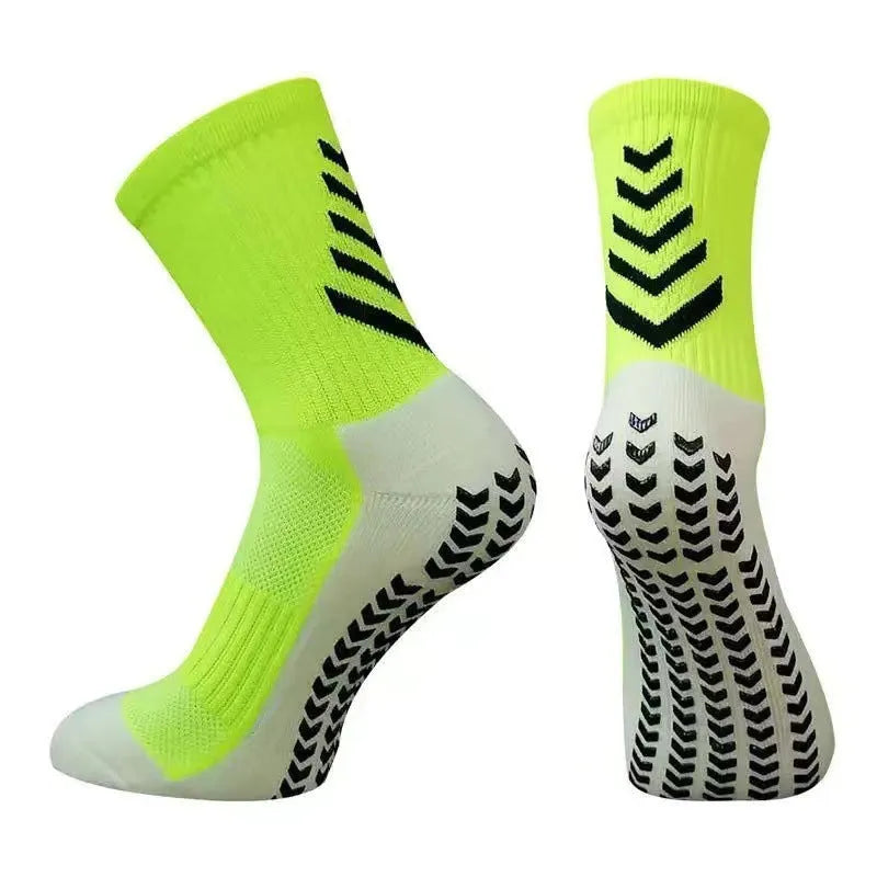 Men's mid-calf athletic socks with non-slip silicone grips in Arrow Black colour with geometric pattern design