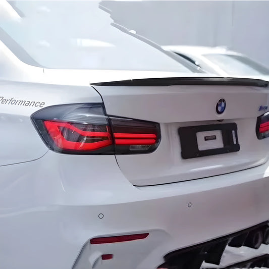BMW 3 Series modified LED tail light assembly in red or smoked black housing.