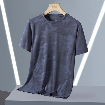 Men's loose fit camouflage nylon short sleeve summer top on a hanger