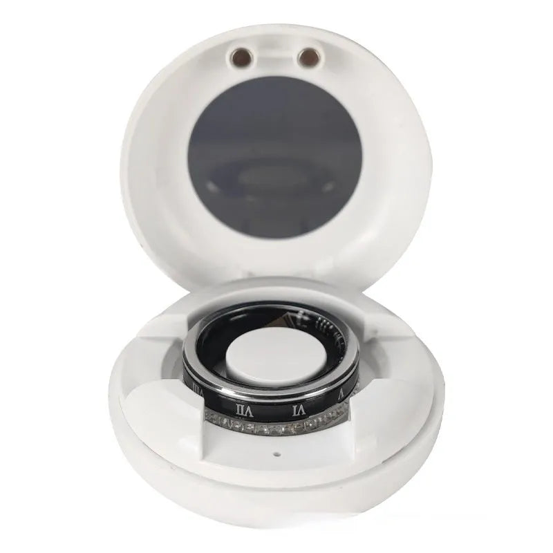 Gold and silver diamond-inlaid smart ring for blood oxygen monitoring on a finger.