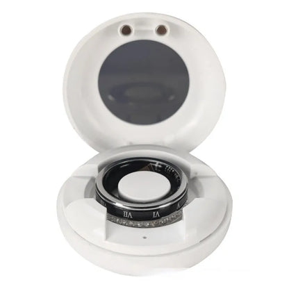 Gold and silver diamond-inlaid smart ring for blood oxygen monitoring on a finger.